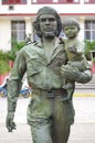 Statue of Che Guevara Holding a Child